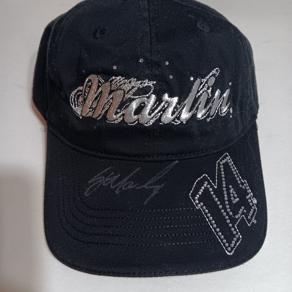 Black Woman's Sterlin Marlin Autographed Hat